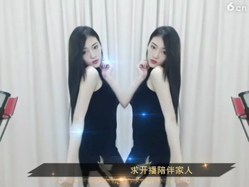 嫣然