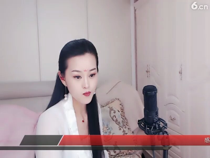 坐着唱