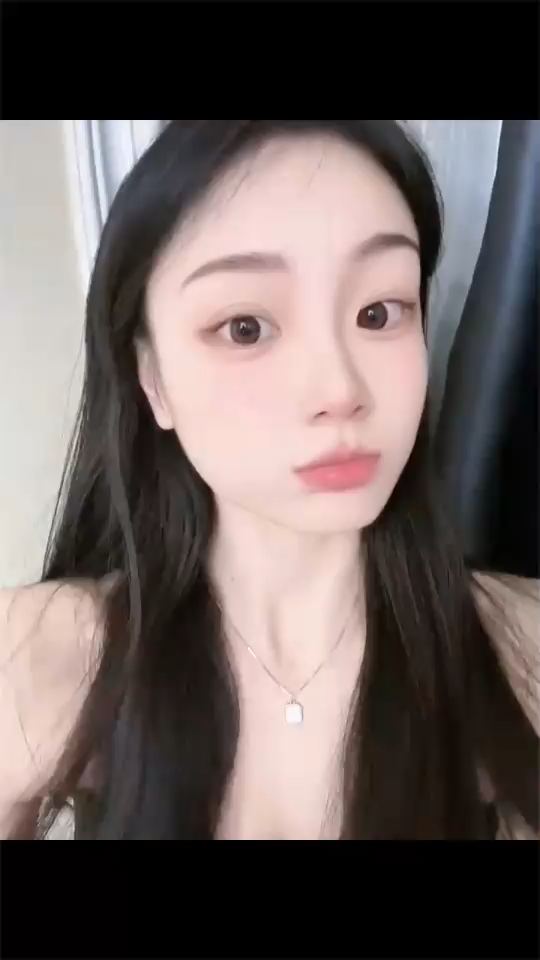 T~