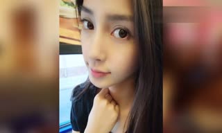 angelababy晒穿篮球衣自拍照 腹部微凸遭质疑已怀孕