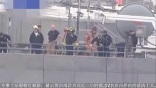 摩天大楼吊篮因钢丝松脱倾斜 两工人命悬71层